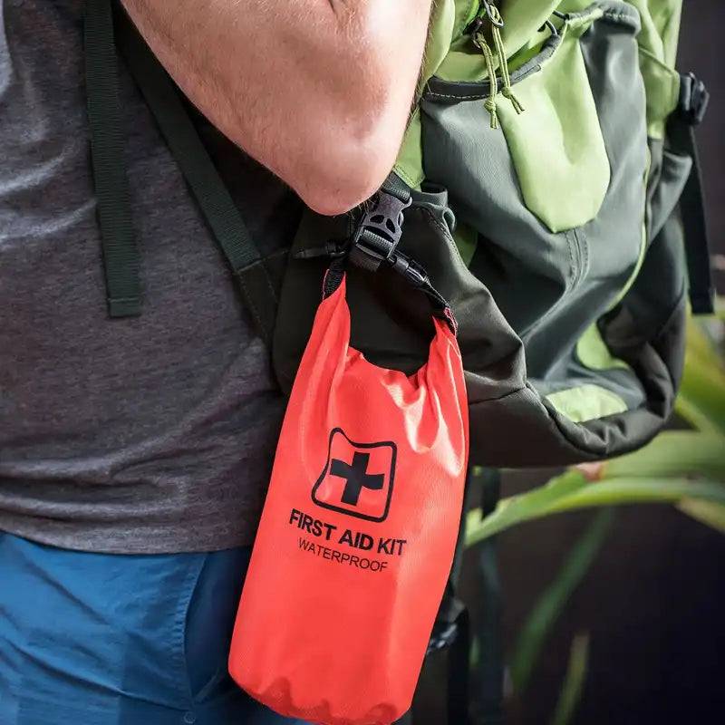 Small First Aid Kit attached to backpack