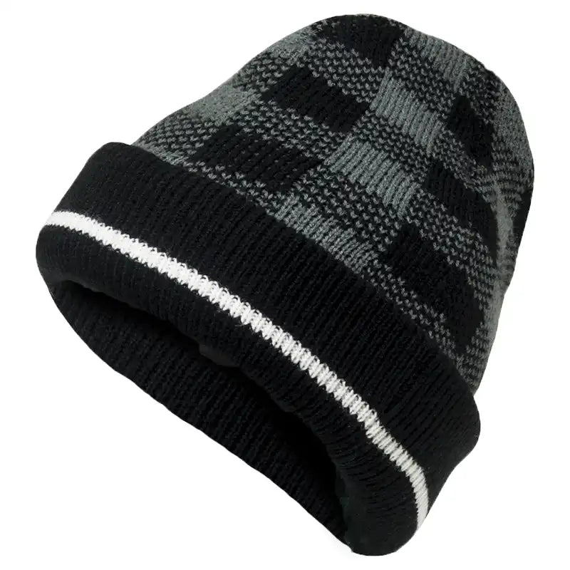 A black and gray plaid knit beanie hat with a black ribbed cuff and a white stripe accent