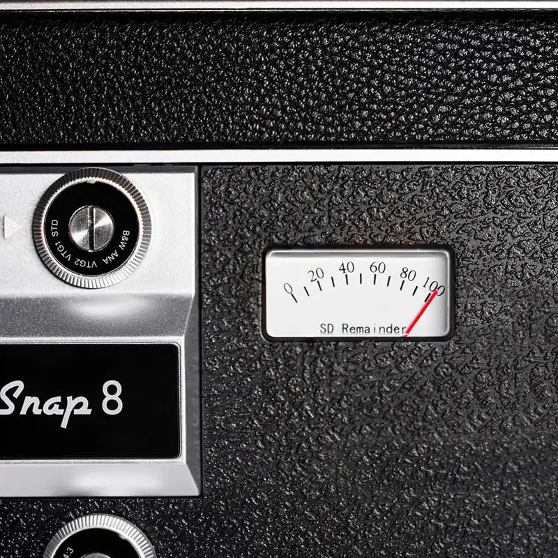 Vintage style Camp Snap camera with a remaining battery indicator.