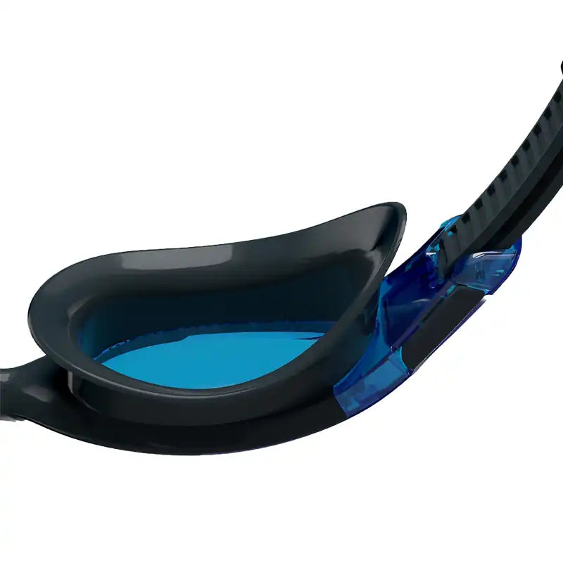 Close-up of blue lensed Speedo swim goggles