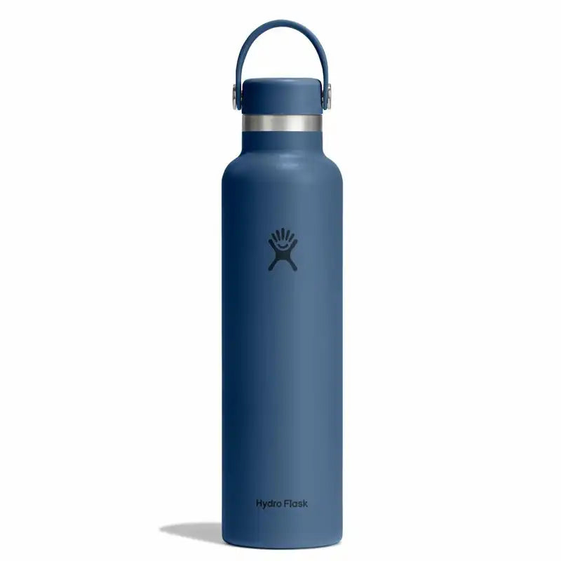 A matte blue Hydro Flask water bottle with a matching blue loop handle and a silver band near the lid